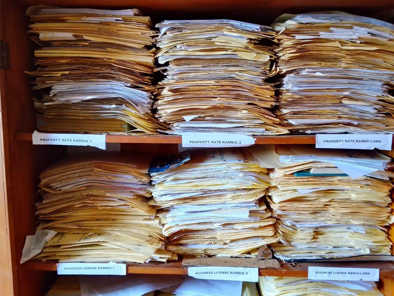 Before — paper rolls & manual process